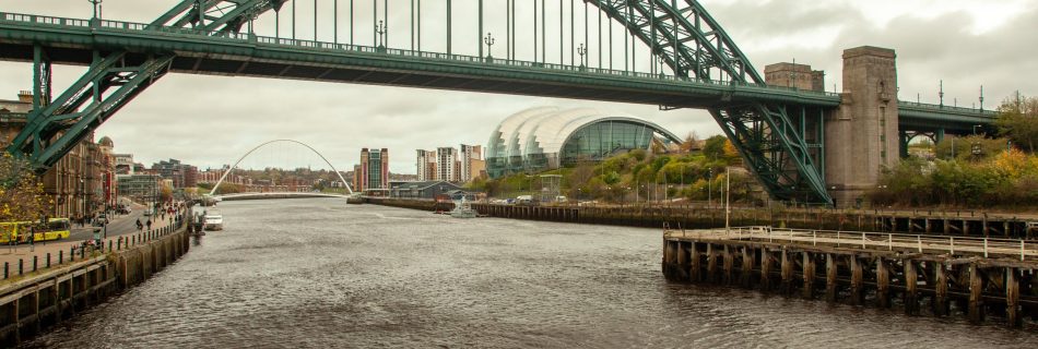 Tyne Bridge and Sage Gateshead in Newcastle, North East England.